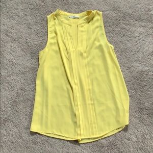 Cute yellow sleeveless top